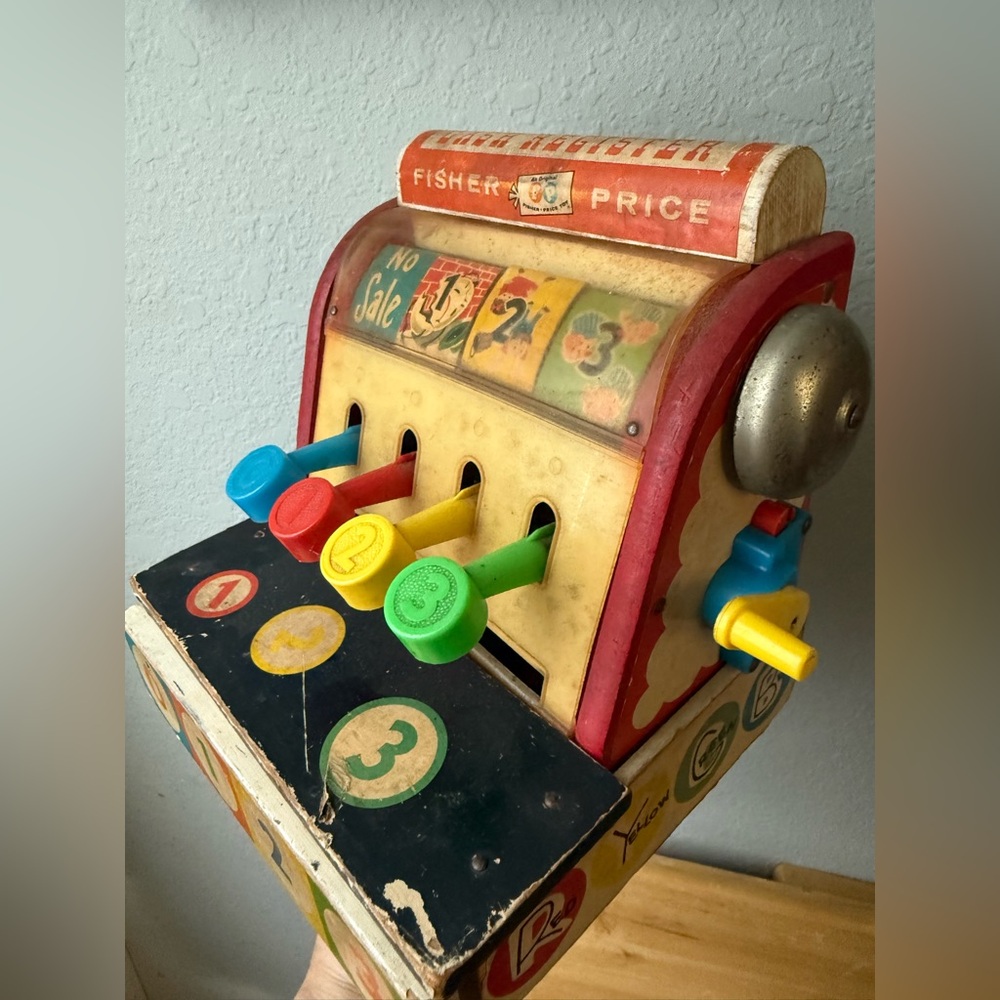 1963 fisher price cash register.  Buttons and drawer works. Bell dings.  Vintage